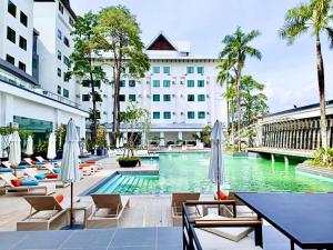 Der Swimmingpool an oder in der Nähe von Wings by Croske Resort Langkawi