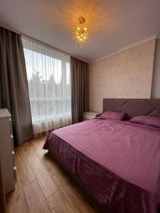 Ένα ή περισσότερα κρεβάτια σε δωμάτιο στο Comfort for you