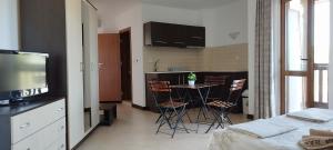 A kitchen or kitchenette at Pearl Apartments Sozopol
