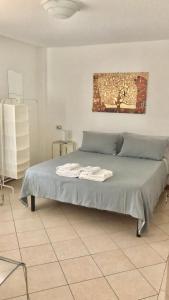 Кровать или кровати в номере Antico Borgo Leone
