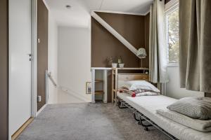 A bed or beds in a room at Villa in Flen in the heart of Sormland