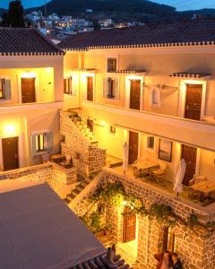 an aerial view of a building at night at Kastro Hotel in Spetses