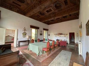Postel nebo postele na pokoji v ubytování Palazzo Ronchelli