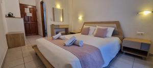 Voodi või voodid majutusasutuse Horizon Resort toas