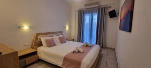 Voodi või voodid majutusasutuse Horizon Resort toas
