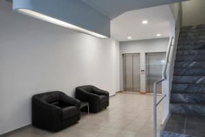 Posedenie v ubytovaní The Apartments by Esperia + 17 fotografií