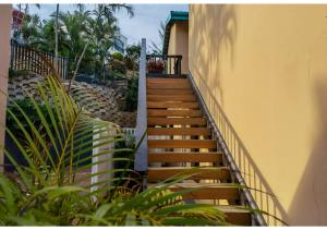 a staircase leading up to a building with plants at Ocean View Villas in Ballito