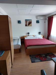 Postel nebo postele na pokoji v ubytování Vila Rocco