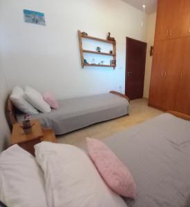 A bed or beds in a room at Family room Rhodes Greece