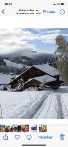 a screenshot of a picture of a house in the snow at Le chalet de Doucy Bardet in Habère-Poche