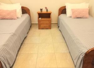 A bed or beds in a room at Family room Rhodes Greece