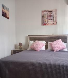 A bed or beds in a room at Family room Rhodes Greece