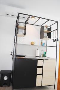 A kitchen or kitchenette at Apartamentos Vicenta Playa Carihuela