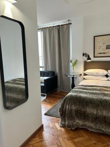 Postel nebo postele na pokoji v ubytování Niko Rooms