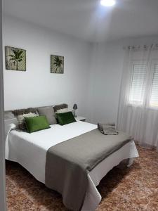 Postel nebo postele na pokoji v ubytování Apartamentos custodio