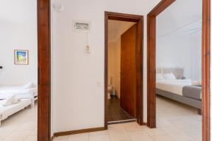 Postel nebo postele na pokoji v ubytování Spathies
