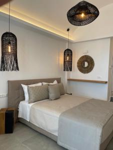 Ein Bett oder Betten in einem Zimmer der Unterkunft Galatia Villas