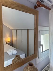 Postel nebo postele na pokoji v ubytování Emelia Apartment