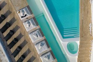 an overhead view of a swimming pool in a hotel at White Stone Mykonos in Agios Ioannis Mykonos