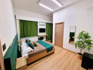 Posteľ alebo postele v izbe v ubytovaní B&B ONE