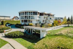 a large apartment building with a building at BlueApart Apartamenty Na Klifie in Władysławowo