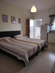 Postel nebo postele na pokoji v ubytování Eva Rooms