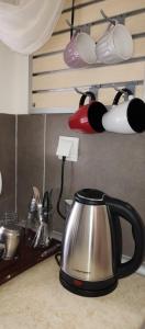 Kuchyň nebo kuchyňský kout v ubytování Eva Rooms
