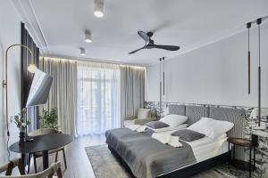 Ein Bett oder Betten in einem Zimmer der Unterkunft Baltic Home