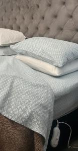 Ένα ή περισσότερα κρεβάτια σε δωμάτιο στο C-Vu-Cottage cosy and warm private apartment