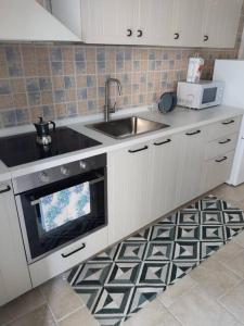Kuchyň nebo kuchyňský kout v ubytování CASA JO