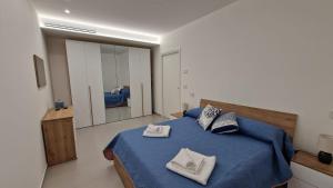 Posteľ alebo postele v izbe v ubytovaní A casa di Fiore, holiday home