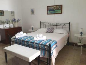 Postel nebo postele na pokoji v ubytování Carulli, Salento e Relax. + 26 fotografií
