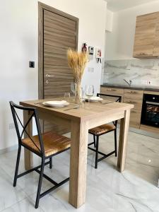Kuchyň nebo kuchyňský kout v ubytování For Rest Aparthotel