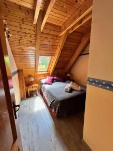 A bed or beds in a room at Apartaments Arenys De Boi