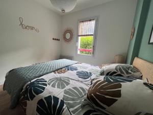 En eller flere senge i et værelse på Urdina