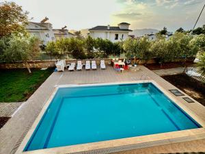 Výhled na bazén z ubytování Almond 2+1 Havuzlu Daire nebo okolí