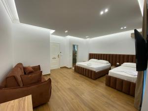 Postel nebo postele na pokoji v ubytování Hotel Vila Mare