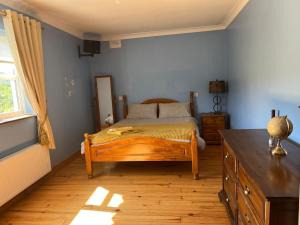 Postel nebo postele na pokoji v ubytování graiguenamanagh Homestay