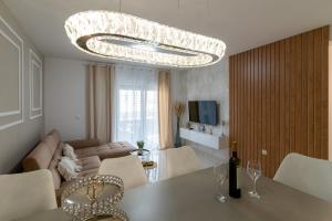 TV a/nebo společenská místnost v ubytování Apartments Angelus