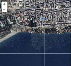a map of a city next to a body of water at Close to the beach (150 m.) and central locations in Antalya