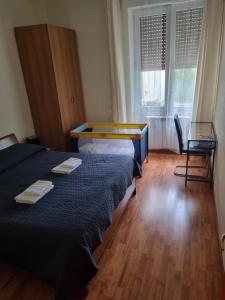Postel nebo postele na pokoji v ubytování Alloggio Silva