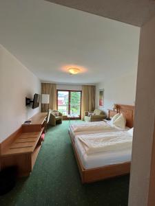 Postel nebo postele na pokoji v ubytování Hotel Goldener Stern