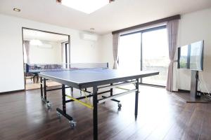 Stolní tenis v ubytování 志摩の別荘 nebo okolí