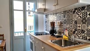 Kuchyň nebo kuchyňský kout v ubytování Ritzi Apartment + 14 fotografií