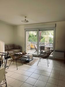 a living room with a couch and a table and chairs at A Torra in Patrimonio +13 photos