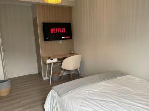 Postel nebo postele na pokoji v ubytování Le Compans: exceptionnel T5 en berges du Canal