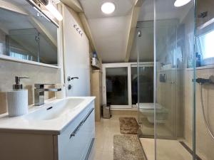 Ванна кімната в Palma Apartments