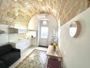 Kuchyň nebo kuchyňský kout v ubytování B&B Suite Amare Polignano