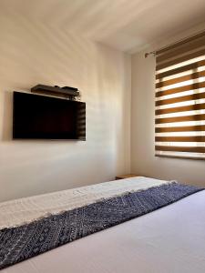 Apartment Tranquilo 객실 침대