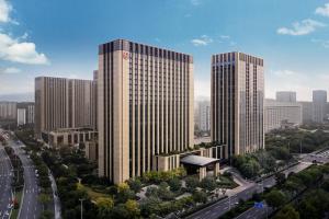 济南济南喜来登酒店的城市中的一组高楼